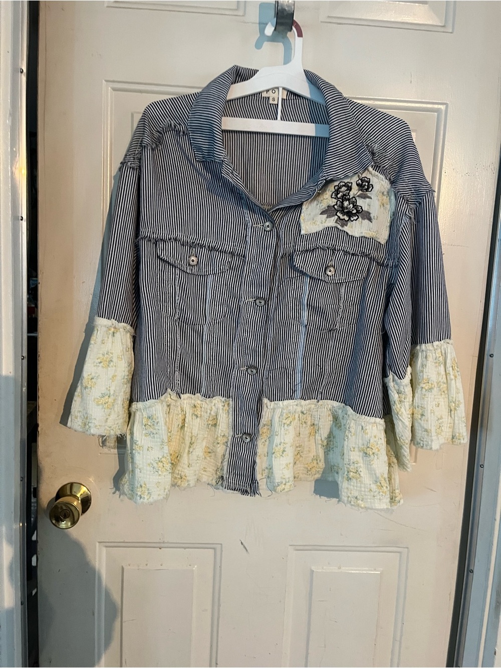 Striped Button-Up top with Floral Patch and Ruffled Hem